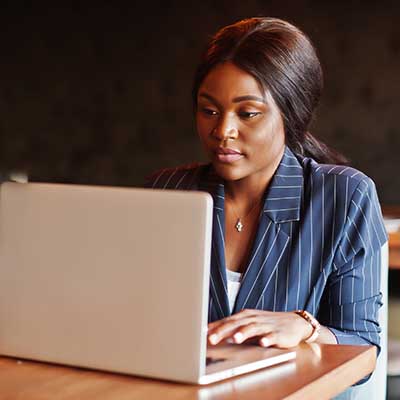 Home african american businesswoman sitting at table in cafe. black g